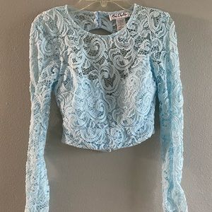 Two piece baby blue colored dress, floral skirt, sparkly top, open back